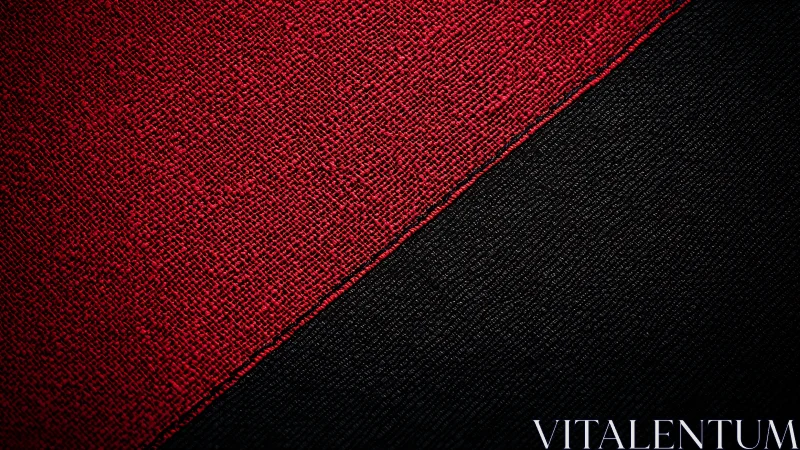 Diagonal division of red and black woven textile surface.