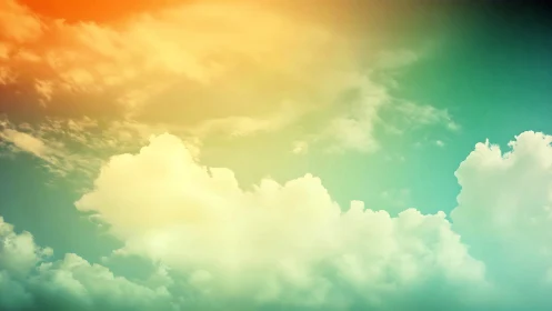 Soft gradient sky with glowing clouds at warm horizon.