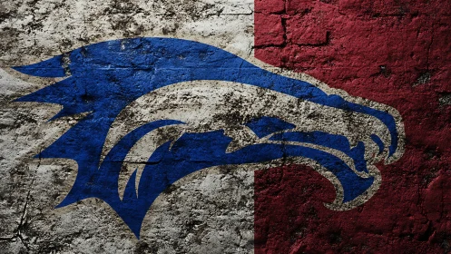 Blue wildcat emblem on cracked red and white wall texture.