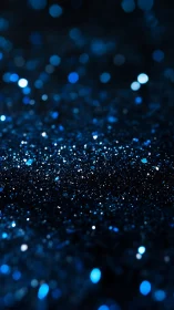 Midnight blue glitter bokeh texture with soft blur depth.