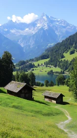 Sunlit mountain valley welcomes quiet cabins and clear lake