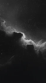 Soft starlit nebula clouds glowing in a calm night sky.