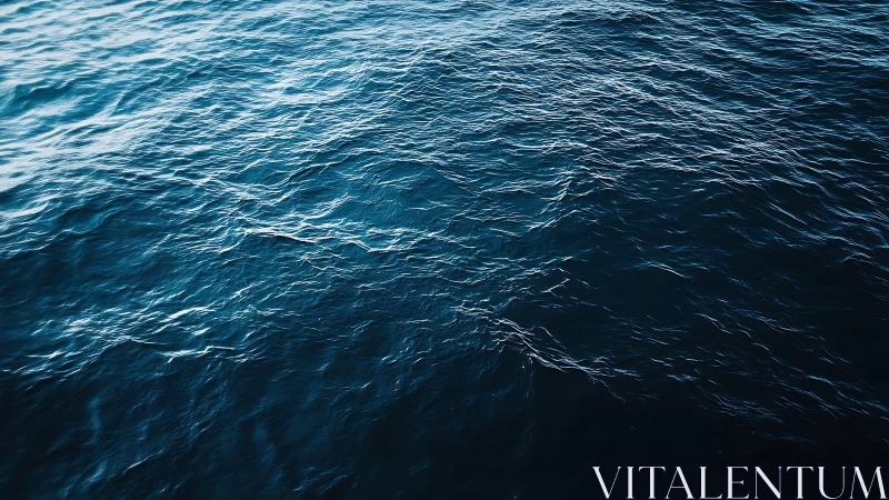 Textured deep ocean surface with directional ripples and glare