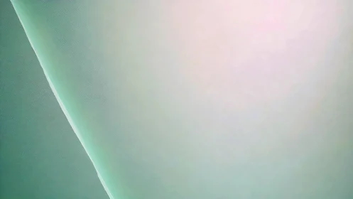 Soft mint gradient wall evokes calm minimal interior mood