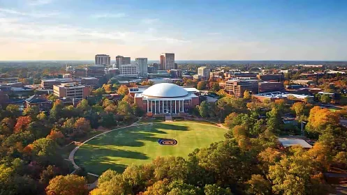 Sunlit college dome and autumn campus skyline panorama.