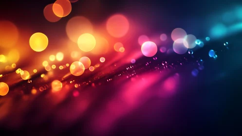 Vibrant abstract bokeh lights in colorful gradient background.