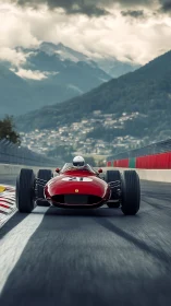 Vintage red race car speeds along alpine circuit track