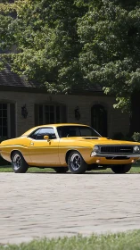 Yellow vintage Dodge Challenger parked by residential house.