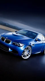 High-gloss blue sports coupe rendered with reflective surface shading