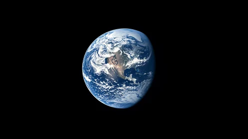 Lonely blue marble gliding through velvet-black cosmic hush.