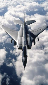 Jet aircraft in high-altitude overflight above cloud layer.