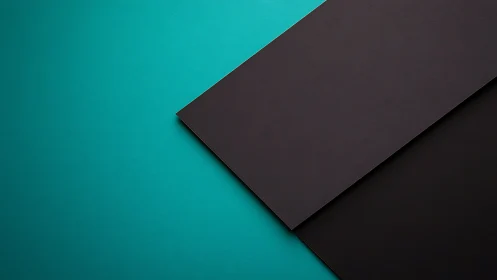 Two dark rectangular panels overlap on a teal background