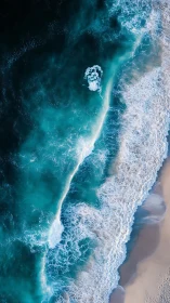 Aerial littoral hydrodynamics with foaming wave interference.