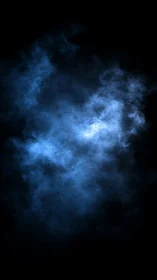 Volumetric blue smoke cloud diffuses softly in deep black space