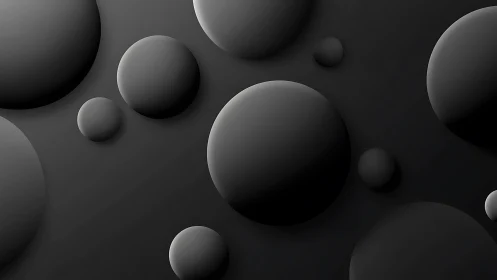 Soft shadowed spheres drifting across deep charcoal space.