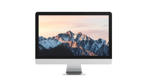 Sleek desktop display showcases serene mountain sunrise view