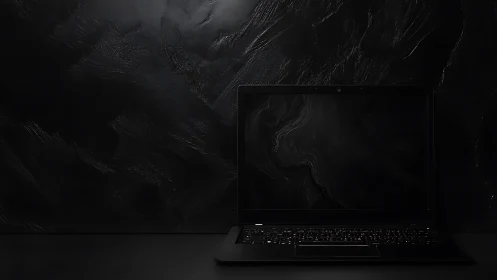 Midnight laptop hums quietly against a brooding charcoal void