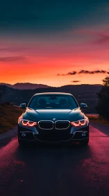 BMW sedan front view glows against vivid sunset sky