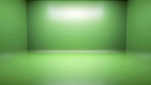 Green chroma key studio wall with soft gradient lighting.