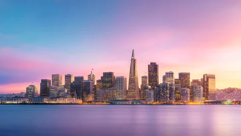 Twilight waterfront skyline with tapered central highrise tower