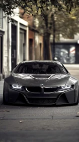 Low grey BMW sports car parked on quiet city street.