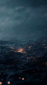 Dark ocean surface with scattered orange luminous particles.
