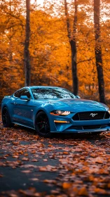 Electric blue sports car glows against rich autumn forest