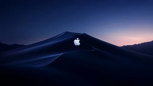 Midnight dunes quietly cradle a glowing fruit of light