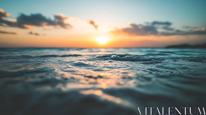 Low-angle ocean horizon at vivid golden hour sunset.