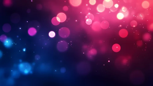 Vibrant pink and blue bokeh abstract background with glowing lights.
