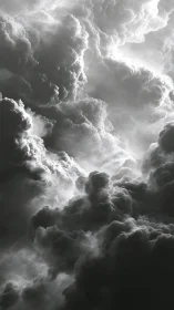 Monochrome storm clouds forming dramatic vertical tower.