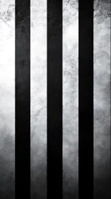 Vertical black stripes divide textured concrete wall surface
