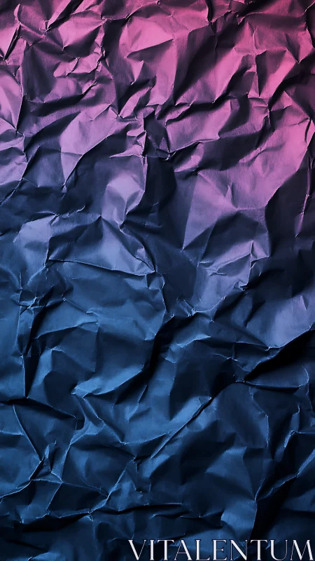 Crumpled paper surface with pink to blue gradient lighting.