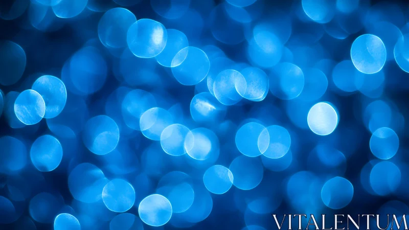 Abstract blue bokeh lights background with soft glowing circles.