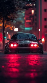 Midnight street BMW glows with bold neon red reflections