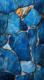Bold blue stone mosaic wall celebrates one golden accent piece