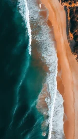 Tidal brushstrokes paint teal surf against ember sand. Period.