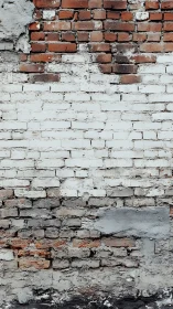 Weathered brick wall quietly rehearses its layered history