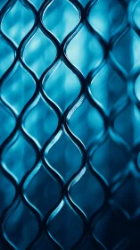 Curved metal mesh pattern under cool blue abstract light.