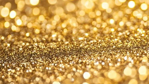 Gold glitter surface forms radiant abstract bokeh field