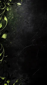 Green vines curl over a textured black backdrop with grit
