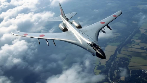 Swept-wing strategic bomber aircraft over layered cloudscape.