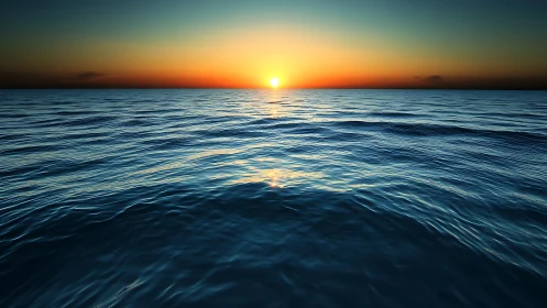 Sunset disc aligns with horizon above textured open ocean