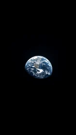 Earth suspended in deep space, high-contrast orbital photograph