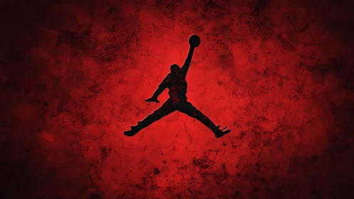 Bold basketball silhouette soars against vivid red energy
