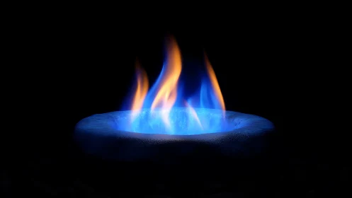 Blue Methane Flame Combustion Phenomenon Against Dark Backdrop.