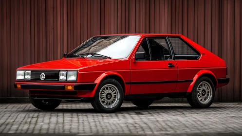Bright red classic VW coupe shining with timeless street charm.
