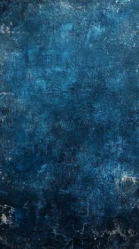 Textured blue painted surface with irregular tonal variation.