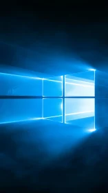 Glowing blue window symbol with radiant light beams.