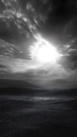 Monochrome storm sky over desolate rolling landscape.